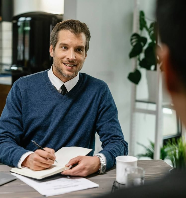 financial-consultant-planning-home-finances-with-his-client-.jpg